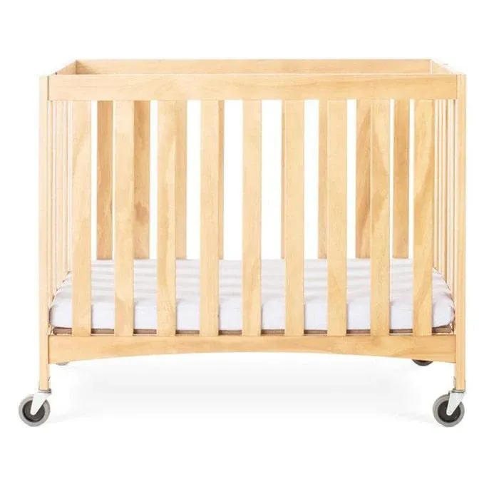 Foundations Travel Sleeper® Compact Folding Crib Slatted with Oversized Casters (Including Foam Mattress)